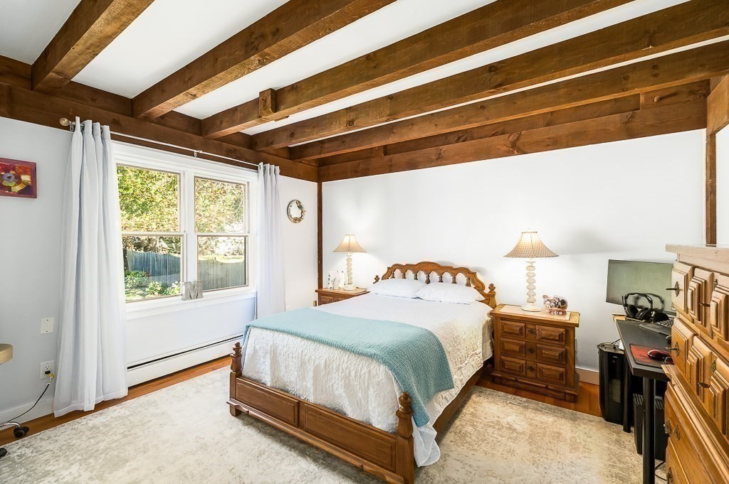 28 Macomber Road Gloucester, MA 01930 - Photo 26 of 40 a bedroom with a bed and a window