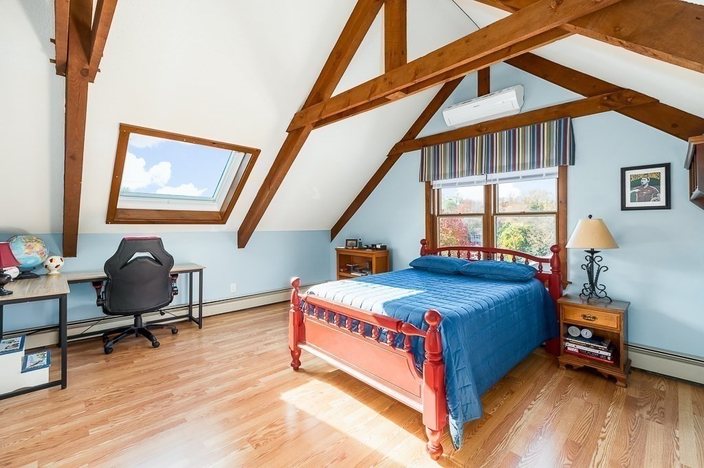 28 Macomber Road Gloucester, MA 01930 - Photo 28 of 40 a bedroom with a bed and a window