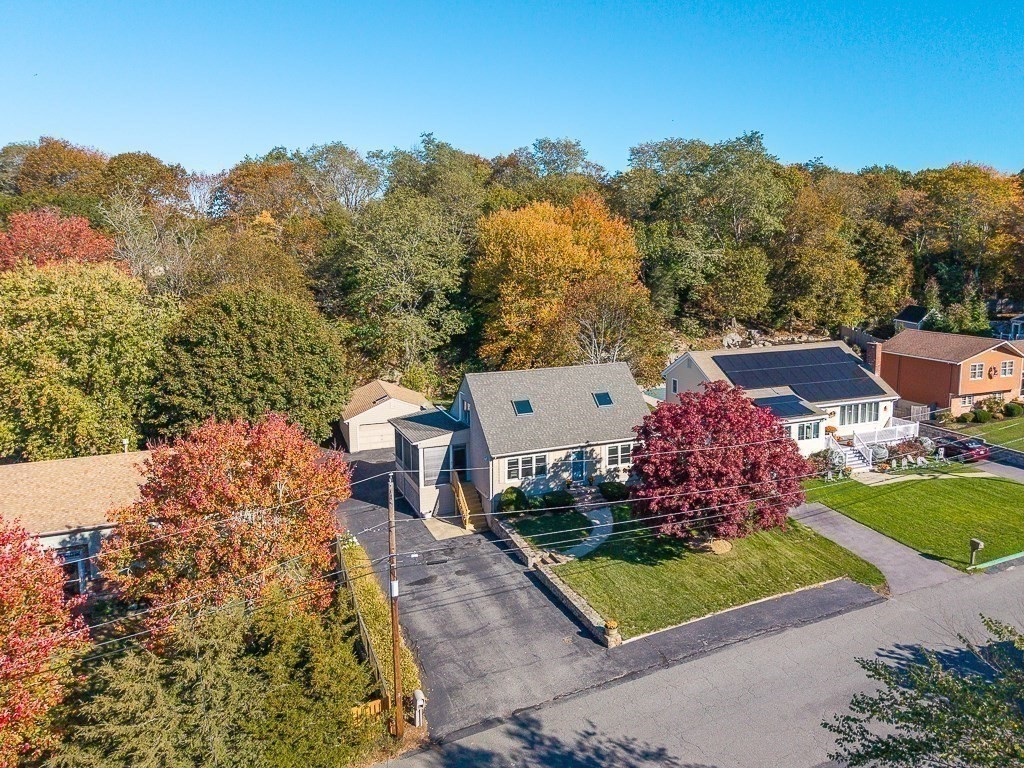 28 Macomber Road Gloucester, MA 01930 - Photo 3 of 40 a view of a backyard with a garden