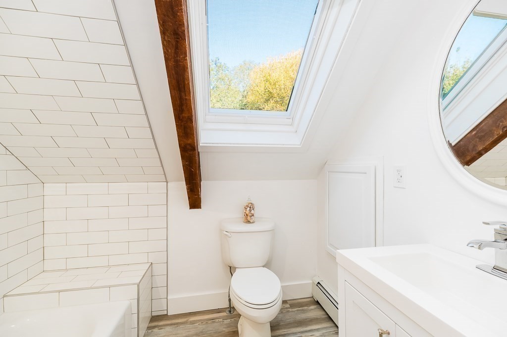 28 Macomber Road Gloucester, MA 01930 - Photo 31 of 40 a bathroom with a sink a toilet and a bathtub