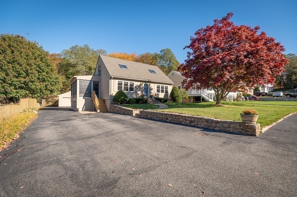 28 Macomber Road Gloucester, MA 01930 - Photo 5 of 40 a view of a house with a yard