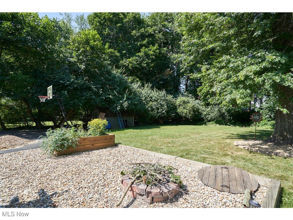 132 Sand Run Road Akron, OH 44313 - Photo 10 of 31 View of yard featuring a garden