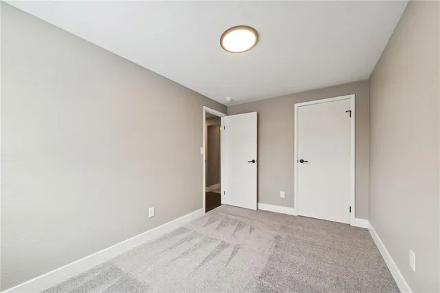 a view of a house with a large window