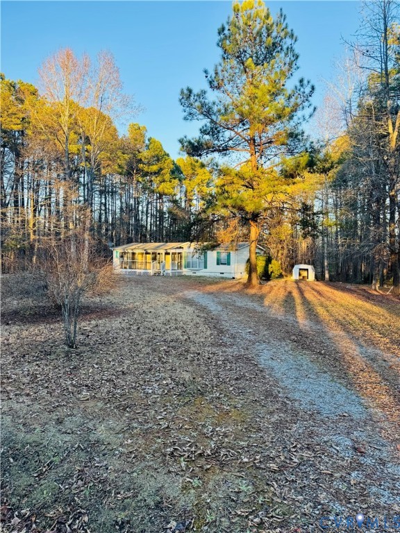 271 Walnut Hill Road Blackstone, VA 23824 - Photo 2 of 7 View of yard featuring an outdoor structure