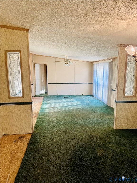 271 Walnut Hill Road Blackstone, VA 23824 - Photo 4 of 7 Unfurnished living room with carpet flooring and a