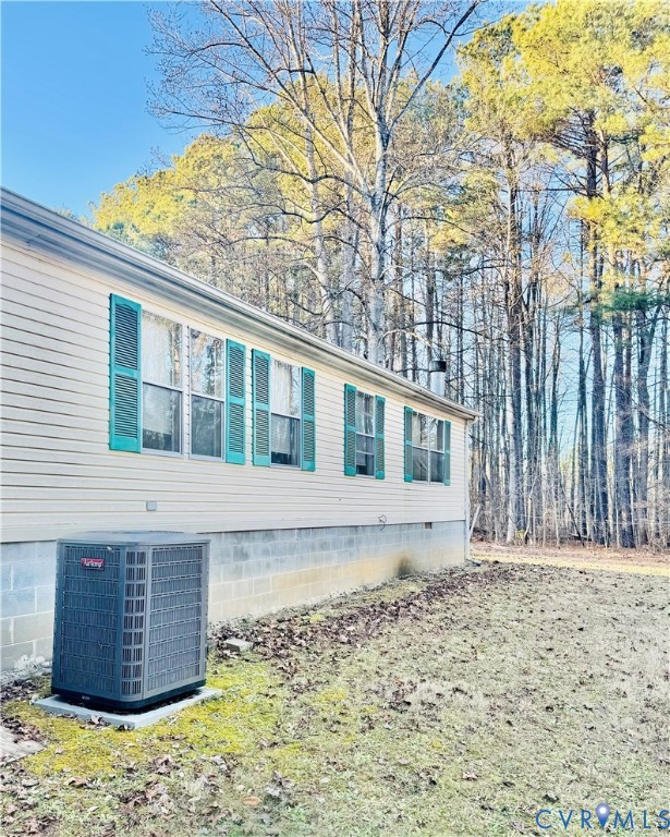 271 Walnut Hill Road Blackstone, VA 23824 - Photo 7 of 7 View of side of property featuring a cooling unit