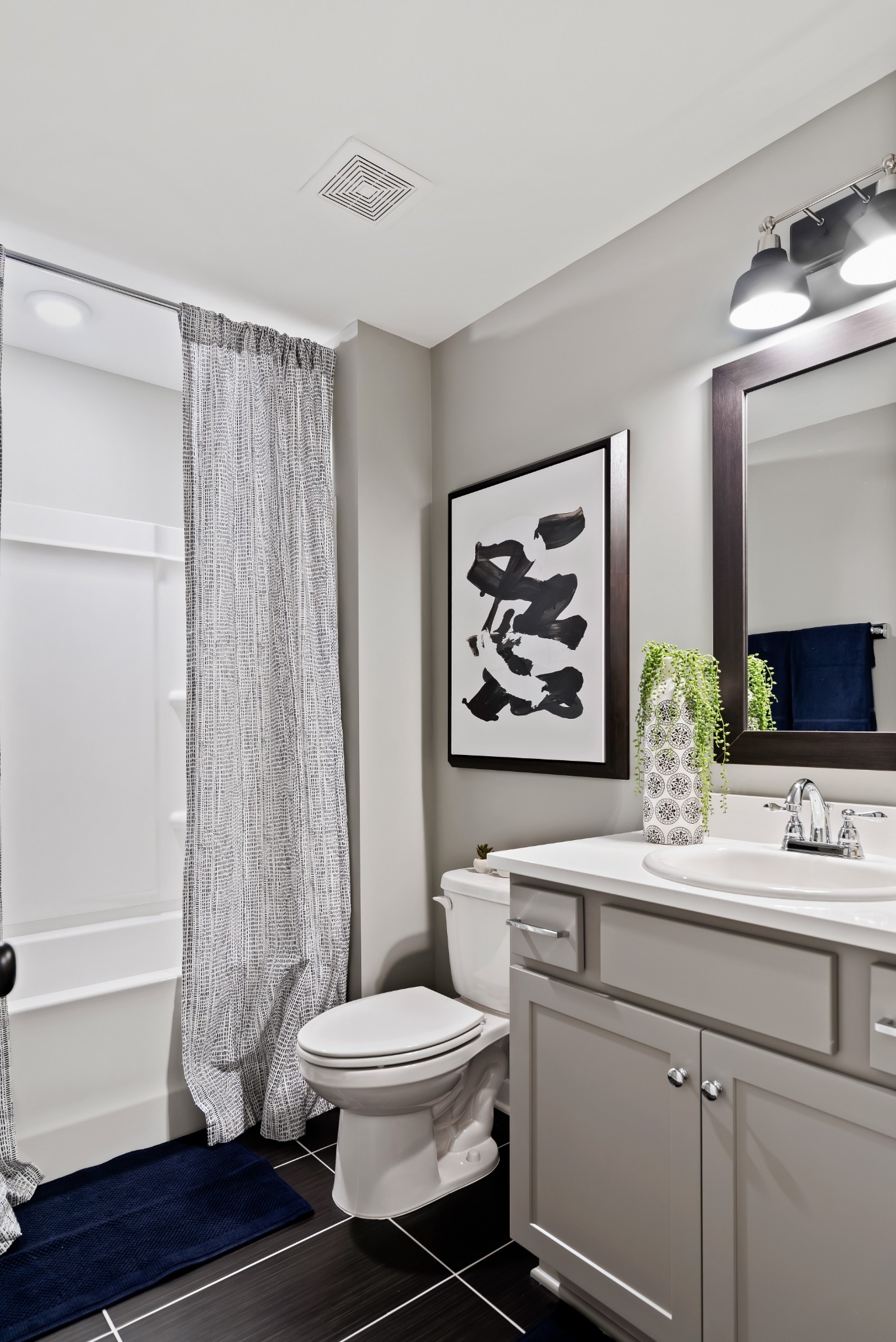 841 Plowson Road Mount Juliet, TN 37122 - Photo 29 of 40 a bathroom with a toilet a sink and a bathtub