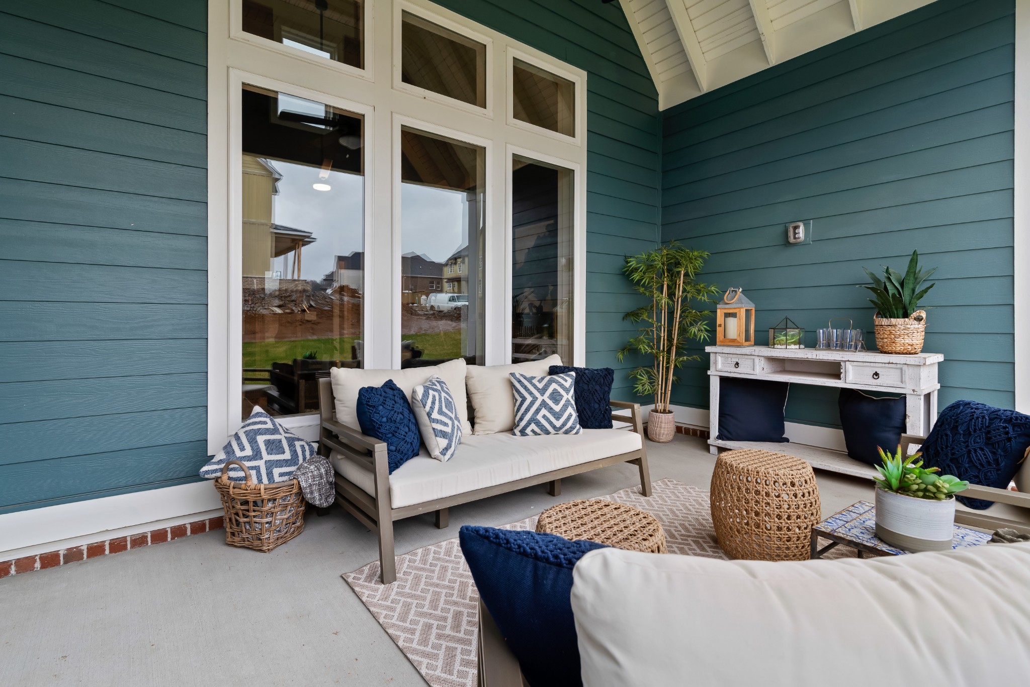 841 Plowson Road Mount Juliet, TN 37122 - Photo 38 of 40 a view of a patio with couches chairs and a potted plant