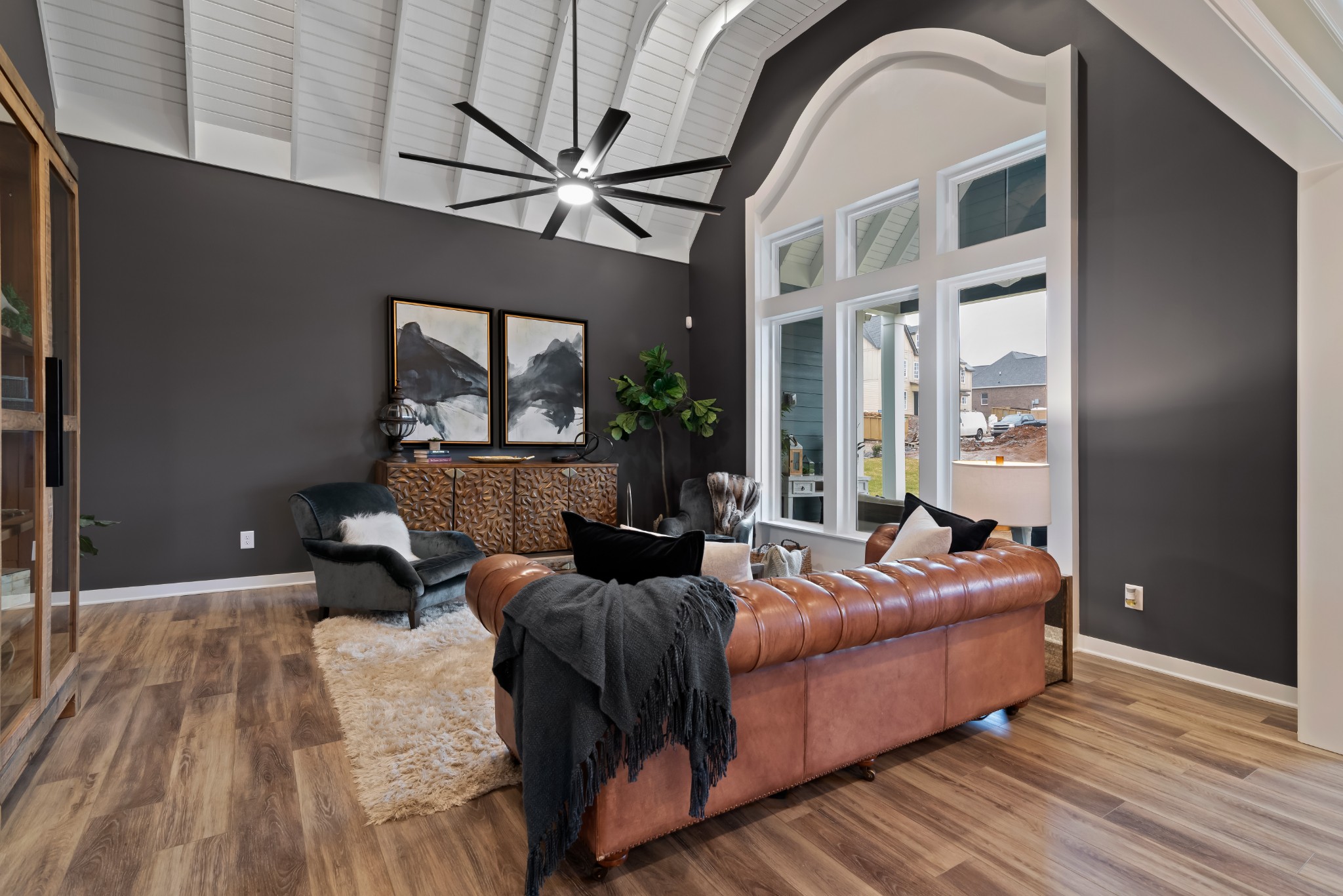 841 Plowson Road Mount Juliet, TN 37122 - Photo 6 of 40 a living room with furniture and a chandelier