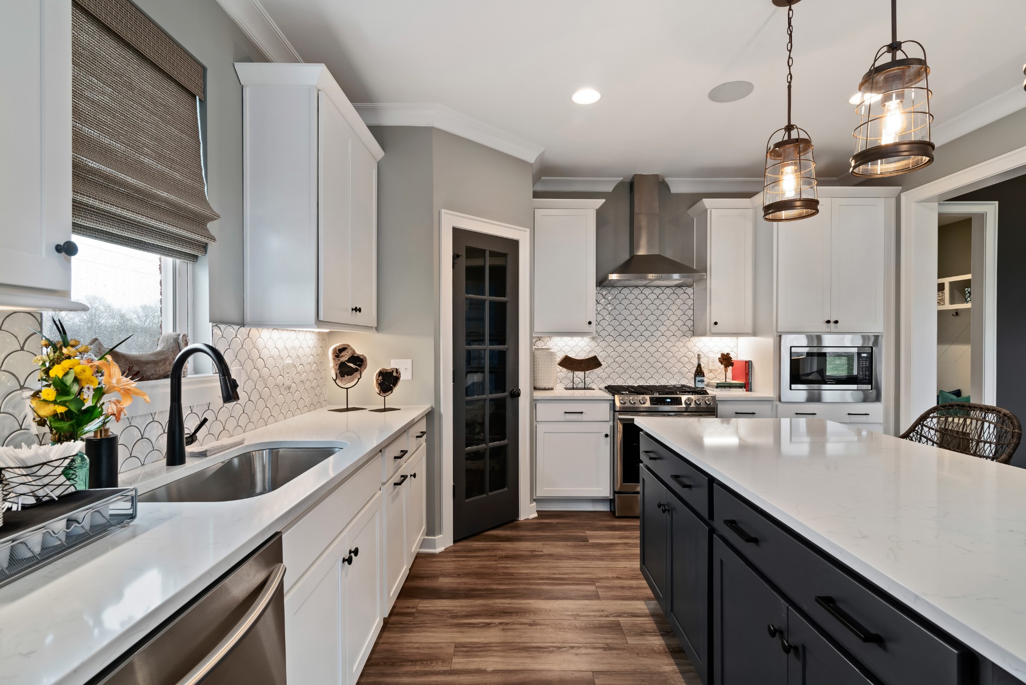 841 Plowson Road Mount Juliet, TN 37122 - Photo 10 of 40 a kitchen with stainless steel appliances granite countertop a sink stove and refrigerator