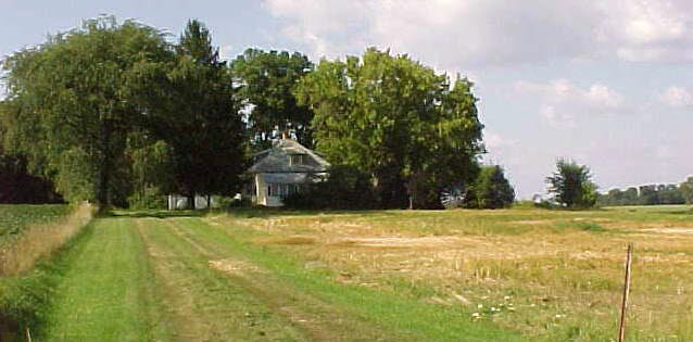 8372 Manchester Road Capron, IL 61012 - Photo 1 of 6 a view of a swimming pool and a yard