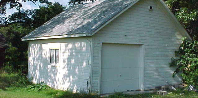 8372 Manchester Road Capron, IL 61012 - Photo 3 of 6 a front view of a house with a yard