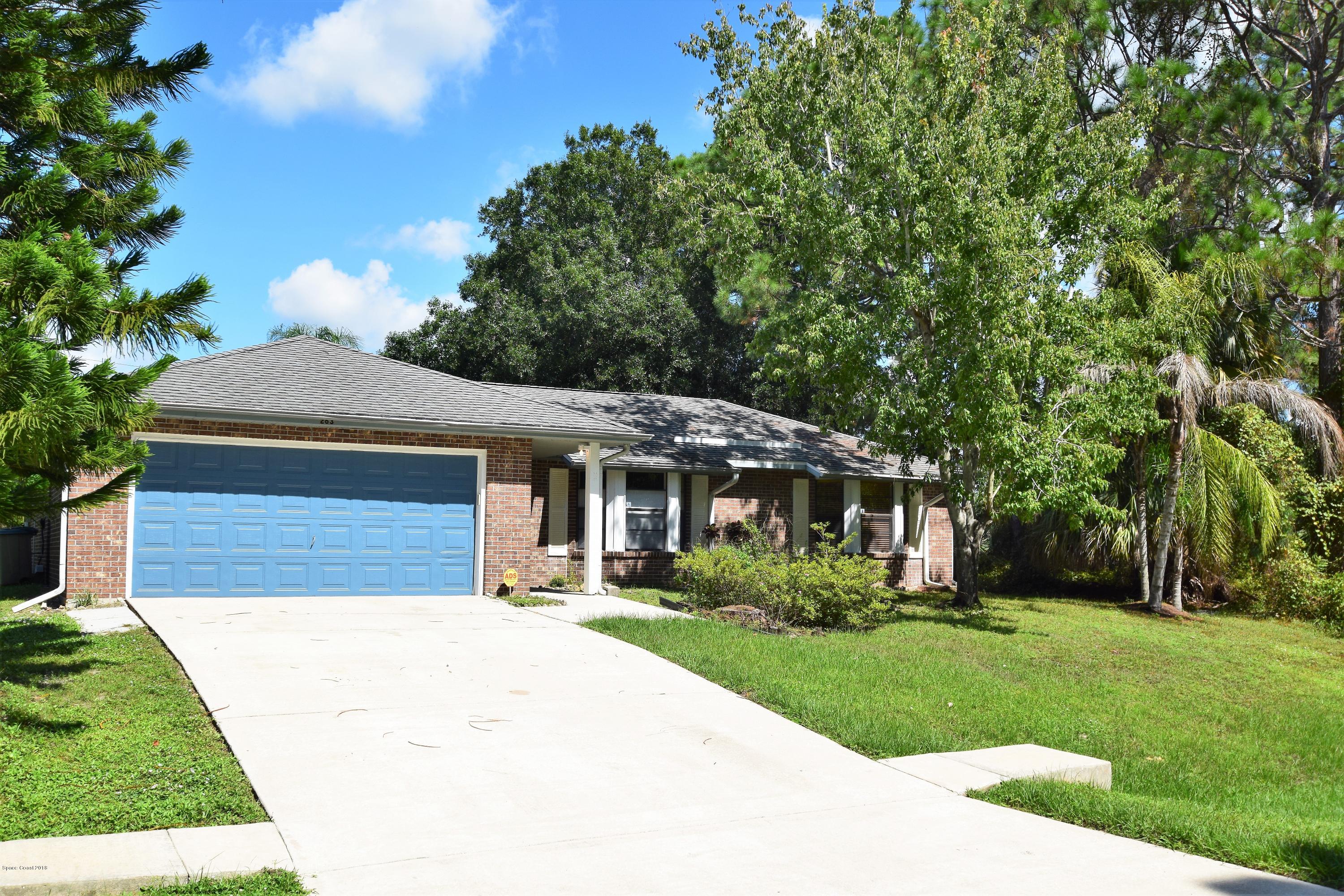 263 Sauders Road Southeast Palm Bay, FL 32909 - Photo 2 of 60 Nice curb appeal