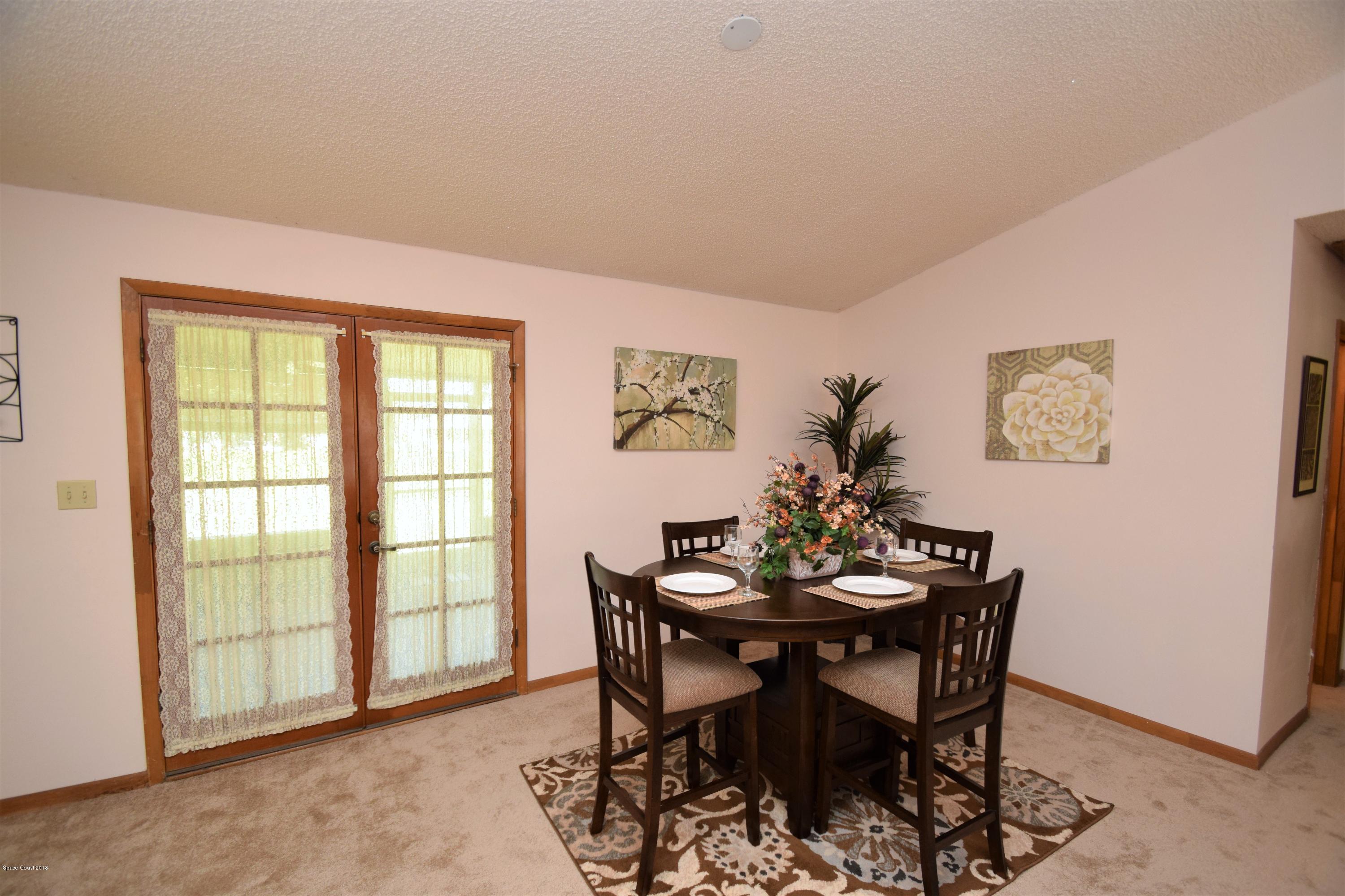263 Sauders Road Southeast Palm Bay, FL 32909 - Photo 14 of 60 Dining Room