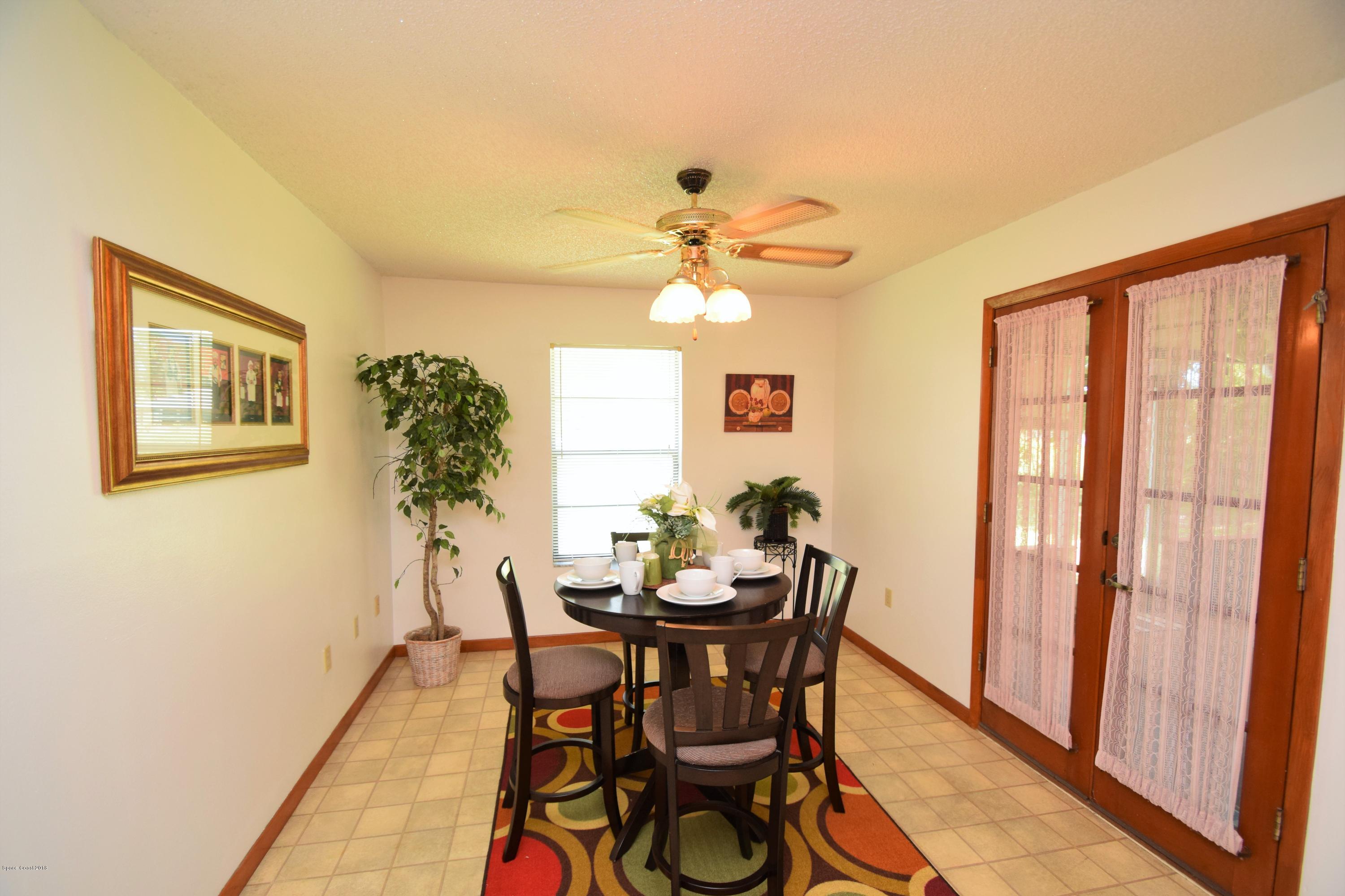 263 Sauders Road Southeast Palm Bay, FL 32909 - Photo 28 of 60 Breakfast Nook - Double french doors