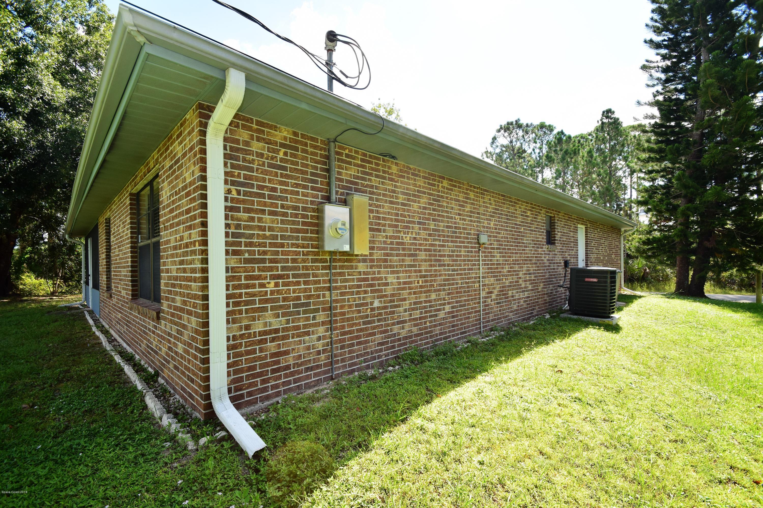 263 Sauders Road Southeast Palm Bay, FL 32909 - Photo 57 of 60 side of home