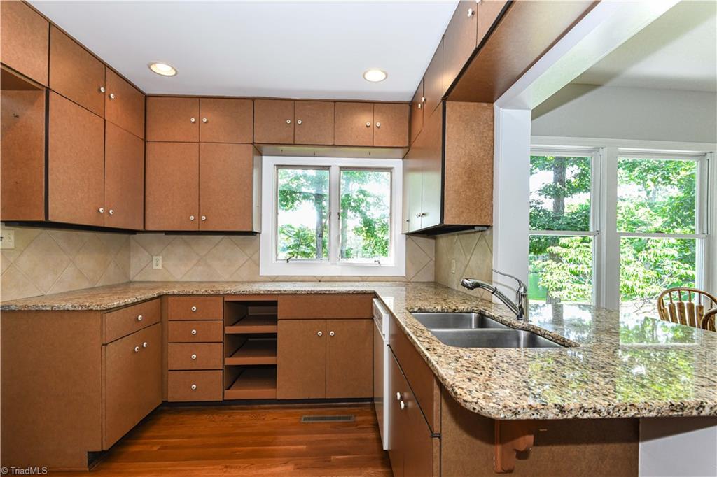 628 Ritters Lake Road Greensboro, NC 27406 - Photo 19 of 49 Kitchen with lake views
