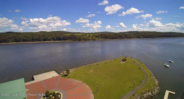 a view of a lake in middle of the town