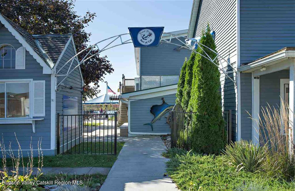 7 Main Street Catskill, NY 12414 - Photo 12 of 29 a view of a house with a small yard and plants