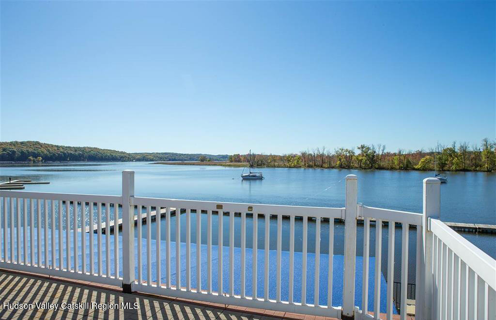 7 Main Street Catskill, NY 12414 - Photo 14 of 29 a view of a roof deck with wooden floor and fence