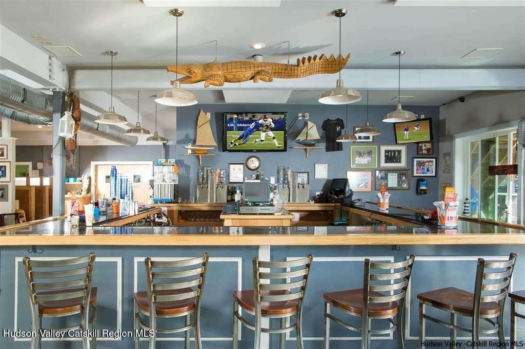 7 Main Street Catskill, NY 12414 - Photo 27 of 29 a kitchen with a table and chairs in it
