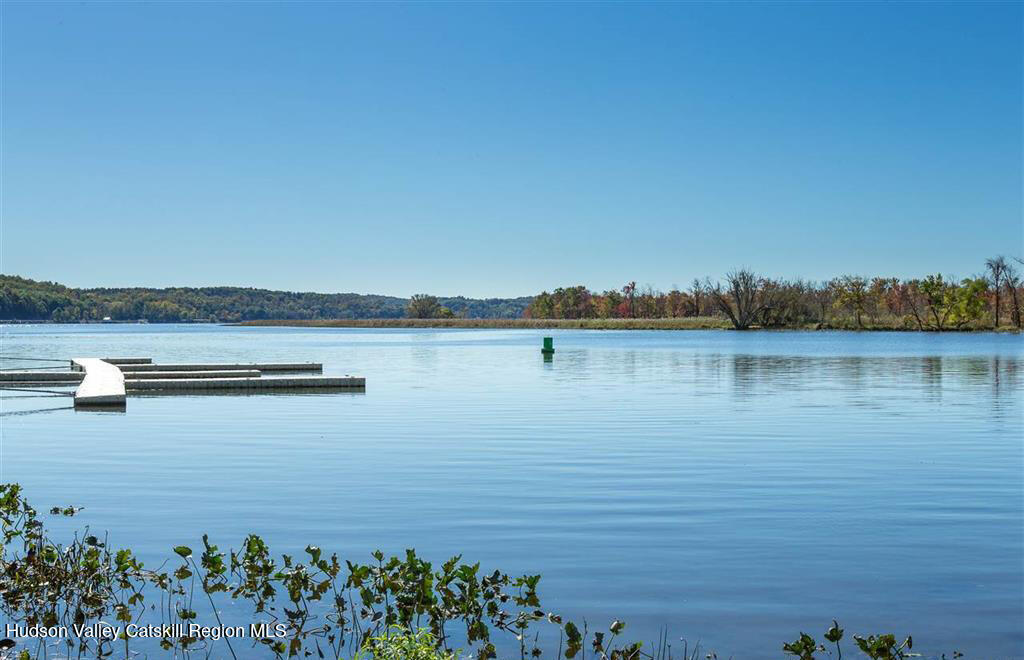 7 Main Street Catskill, NY 12414 - Photo 6 of 29 a view of a lake with houses in the back
