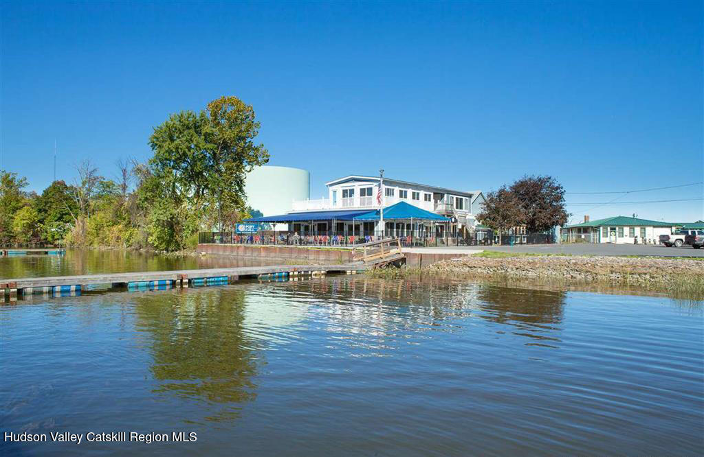 7 Main Street Catskill, NY 12414 - Photo 10 of 29 a view of swimming pool with outdoor seating and yard in the back