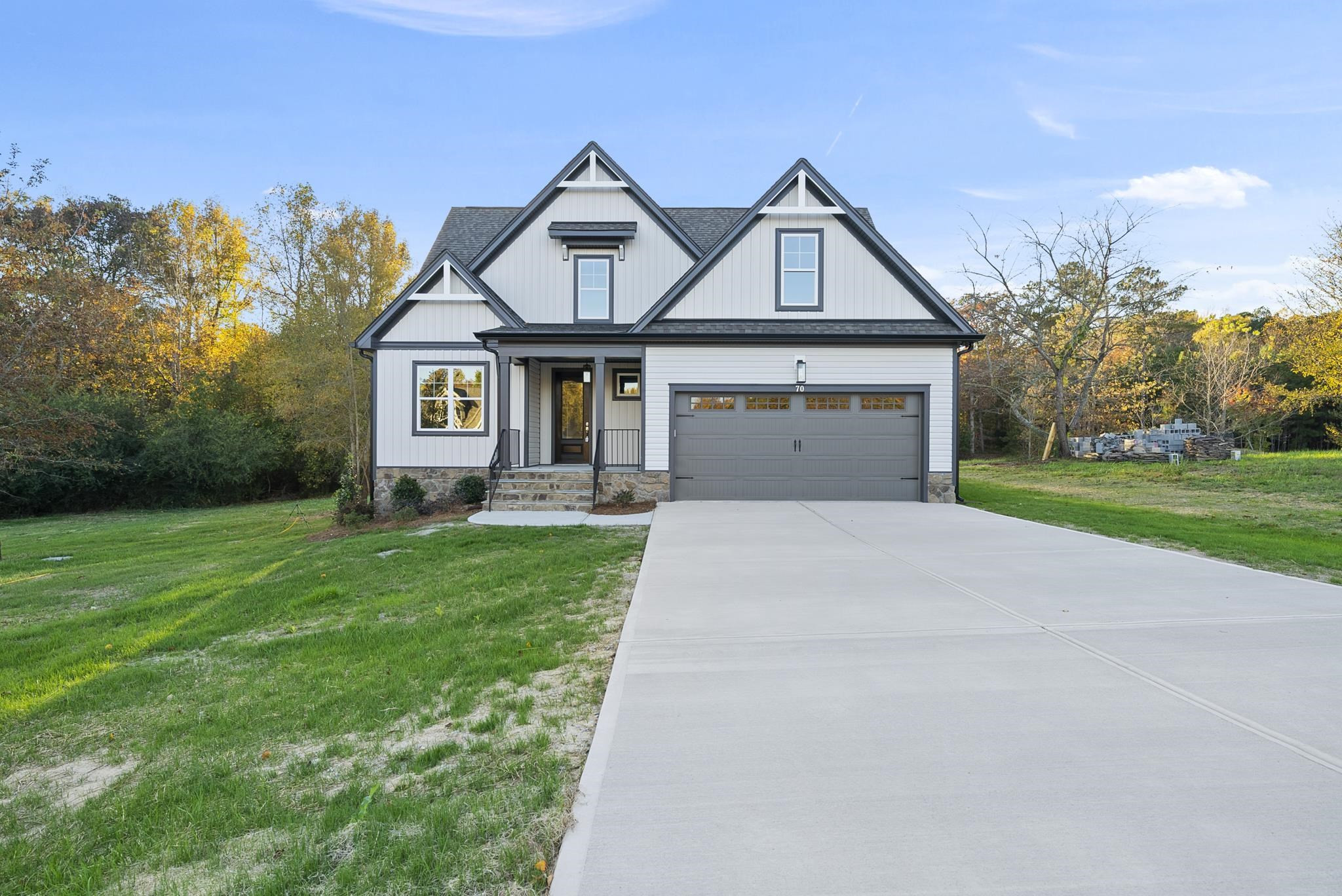 front view of a house with a yard