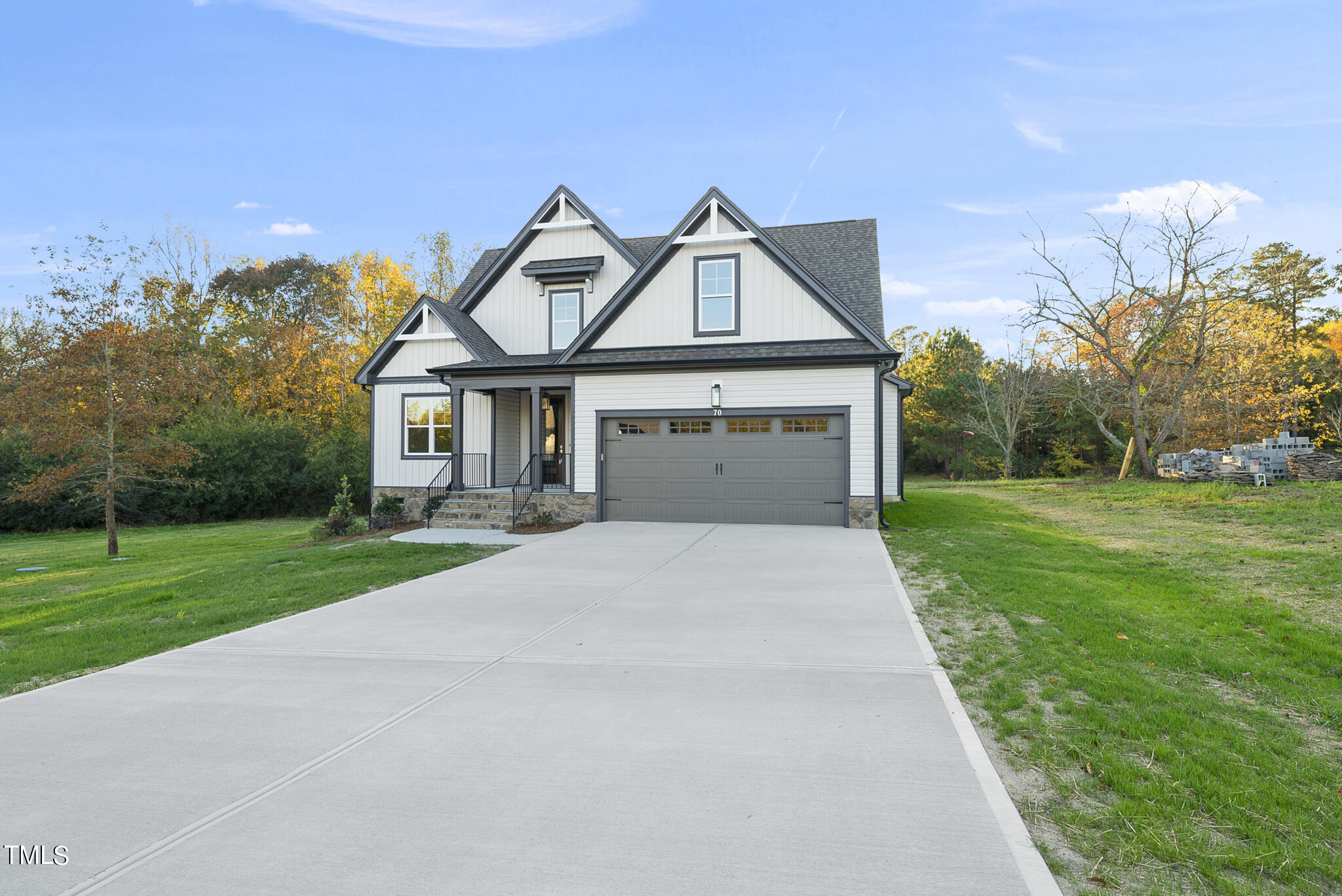 70 Pilot Ridge Road Zebulon, NC 27597 - Photo 2 of 37 a front view of a house with yard