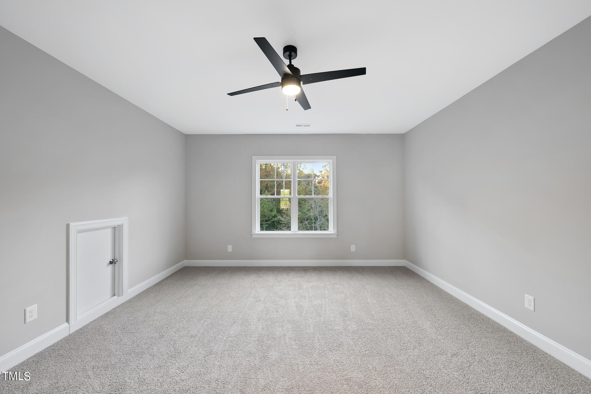 70 Pilot Ridge Road Zebulon, NC 27597 - Photo 29 of 37 wooden floor in an empty room with a window