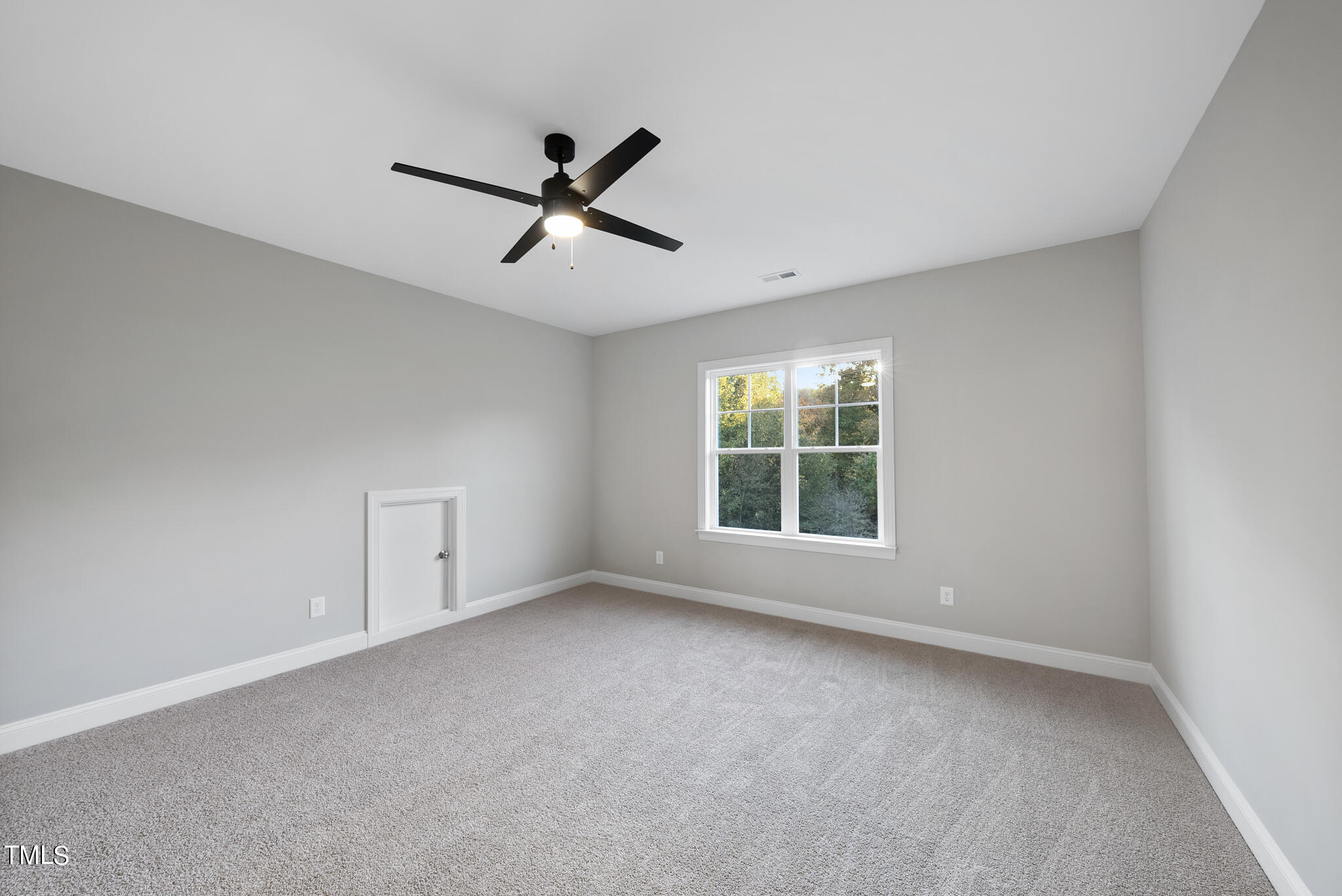 70 Pilot Ridge Road Zebulon, NC 27597 - Photo 30 of 37 a view of empty room with windows