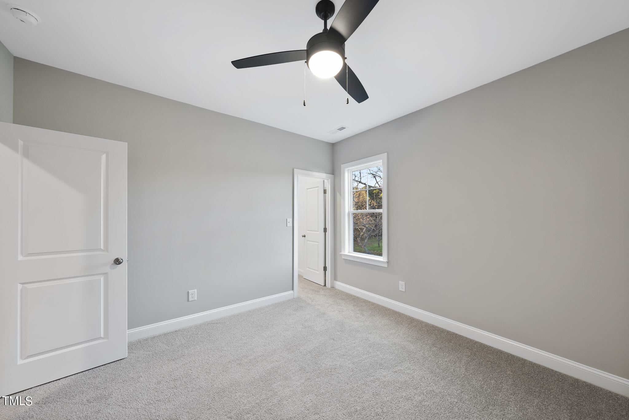 70 Pilot Ridge Road Zebulon, NC 27597 - Photo 34 of 37 a view of an empty room with a window