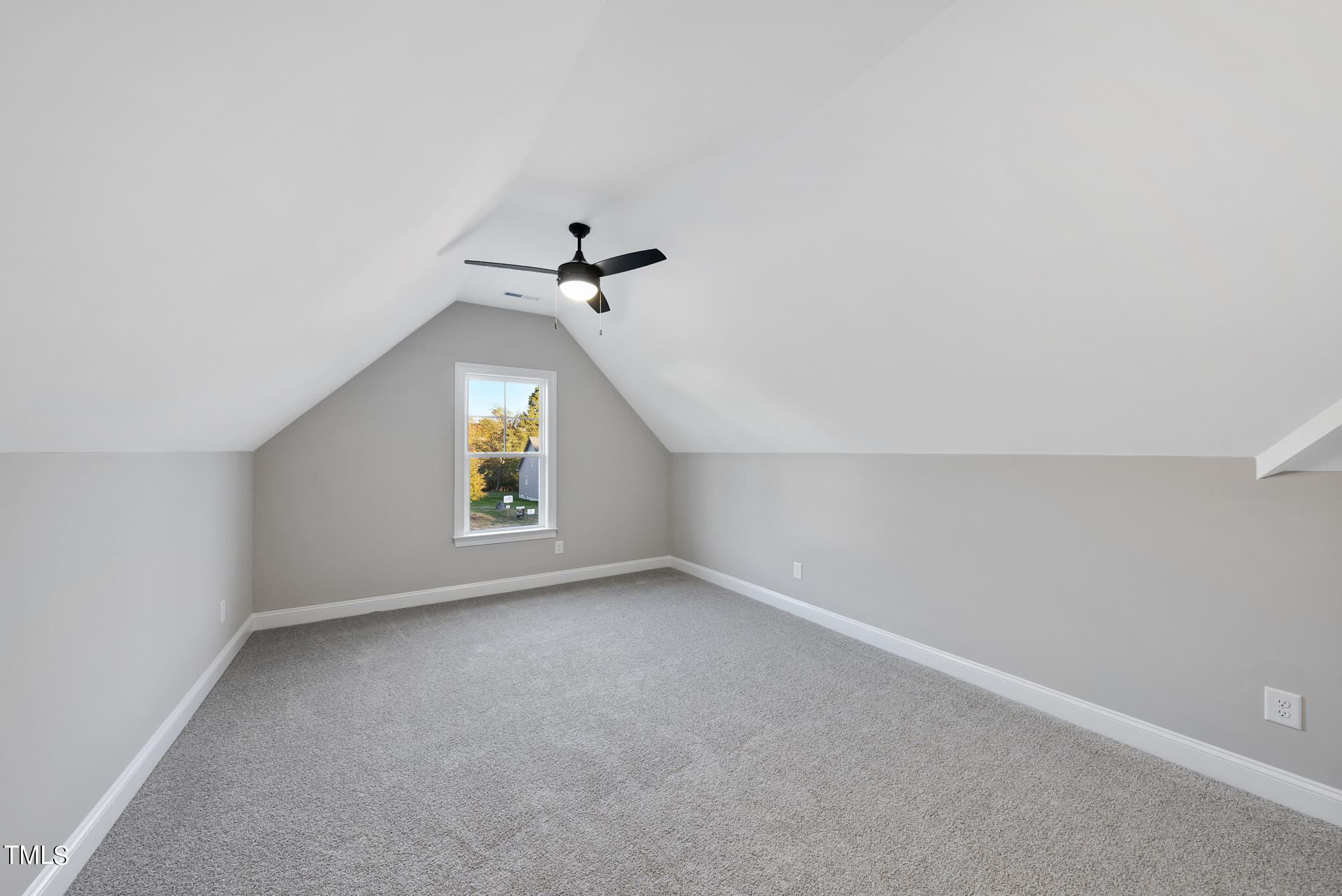70 Pilot Ridge Road Zebulon, NC 27597 - Photo 37 of 37 an empty room with windows and fan