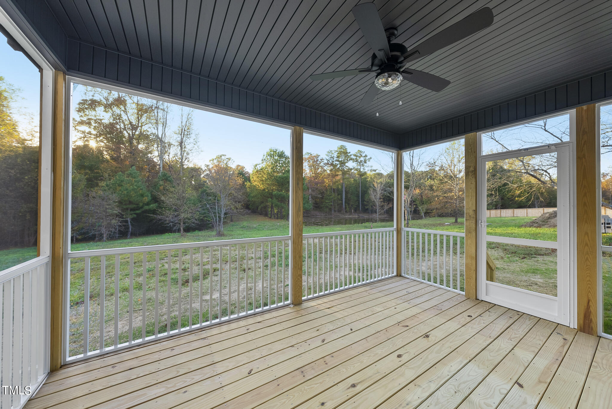 70 Pilot Ridge Road Zebulon, NC 27597 - Photo 4 of 37 a view of a room with wooden floor and outdoor space