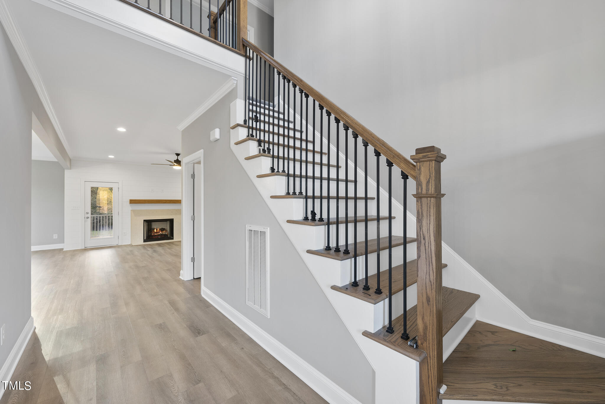 70 Pilot Ridge Road Zebulon, NC 27597 - Photo 7 of 37 a view of entryway and hall with wooden floor
