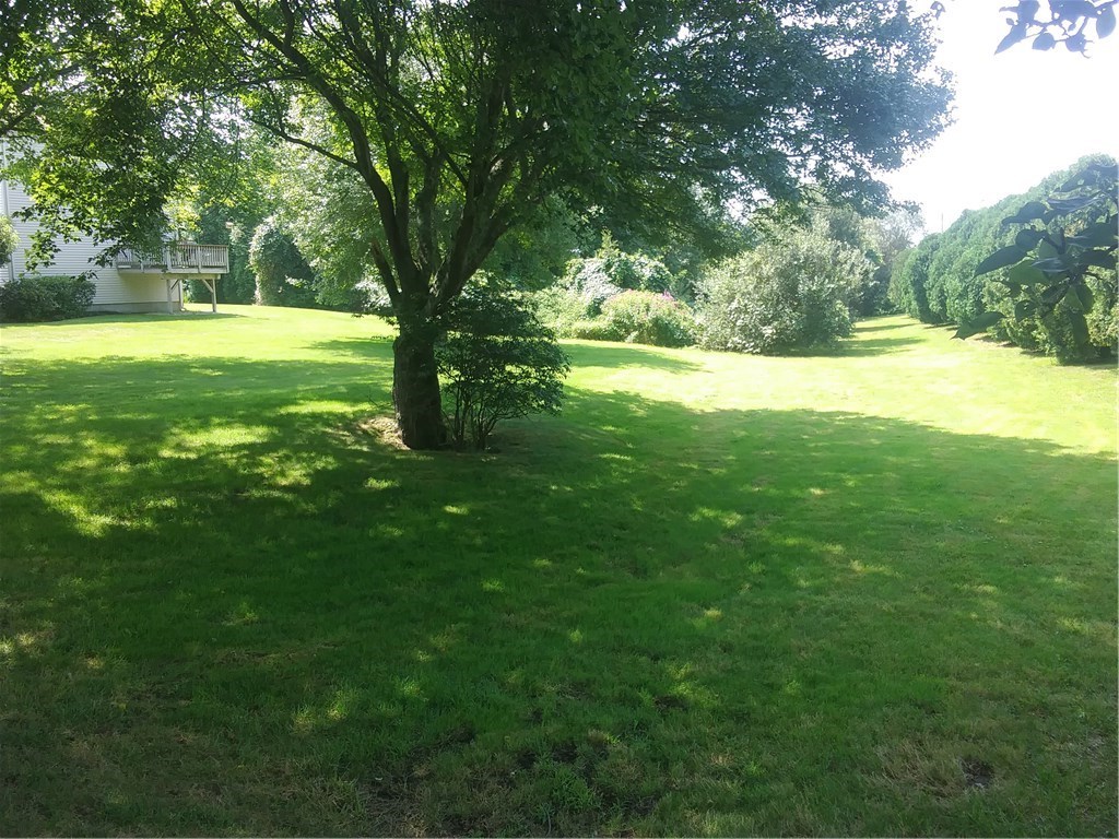 660 Point Judith Road, Unit B 3 Narragansett, RI 02882 - Photo 16 of 19 Landscaped open space across from unit.