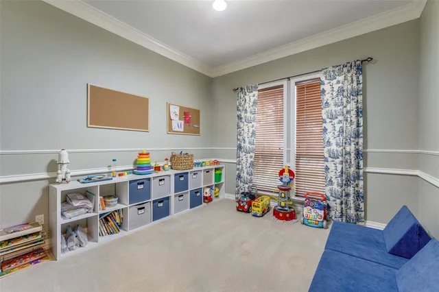a room with furniture and a book shelf