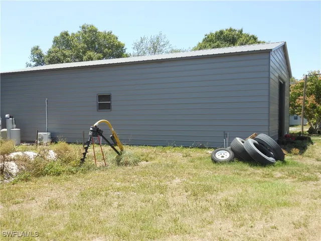 a house view with a backyard space