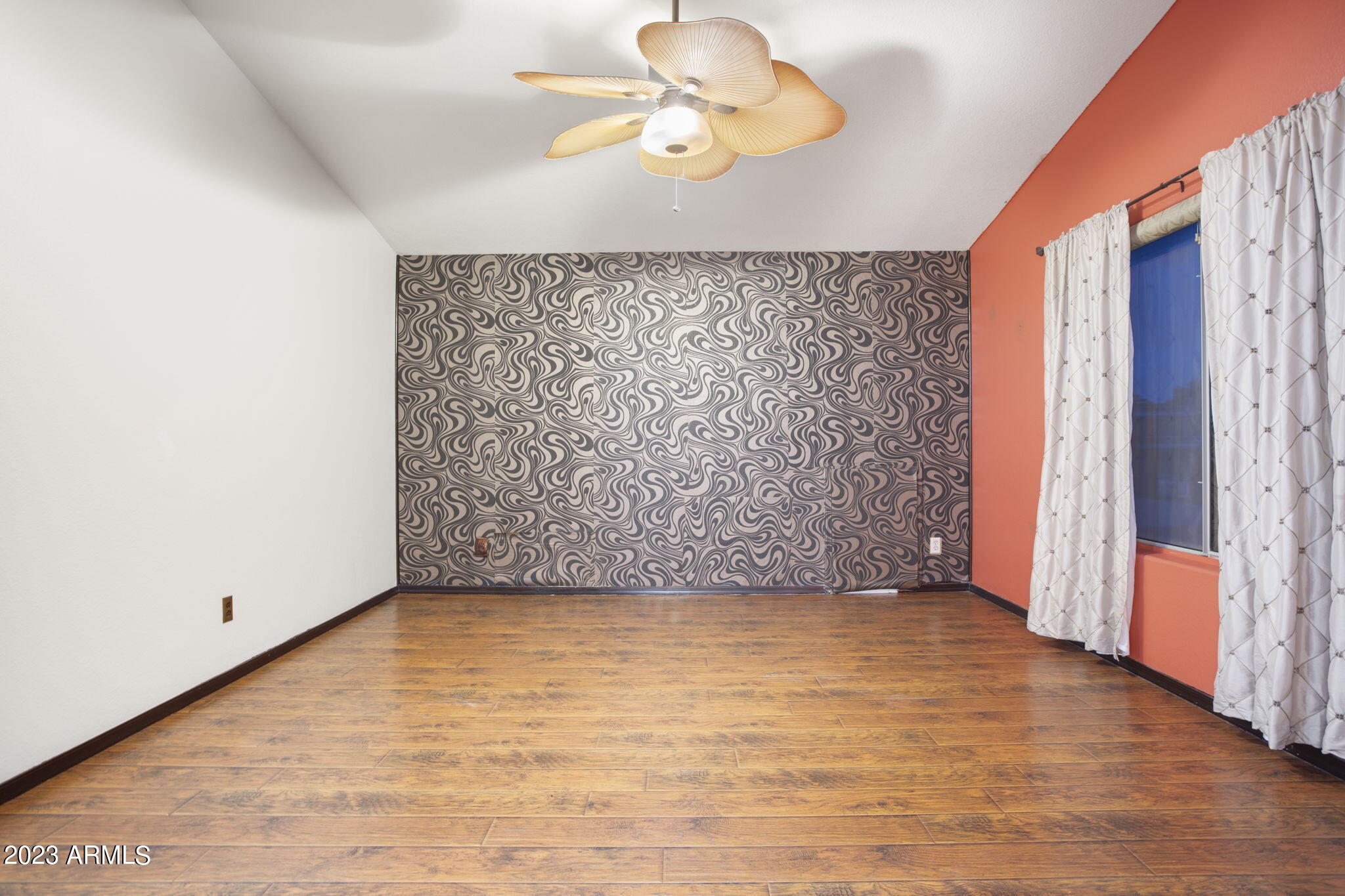 7775 North 52nd Drive Glendale, AZ 85301 - Photo 25 of 51 a view of an empty room with a window