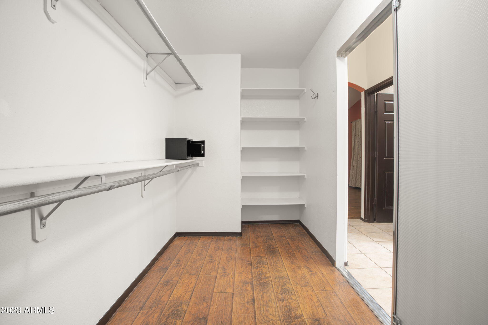 7775 North 52nd Drive Glendale, AZ 85301 - Photo 30 of 51 a view of a room with wooden floor and entryway
