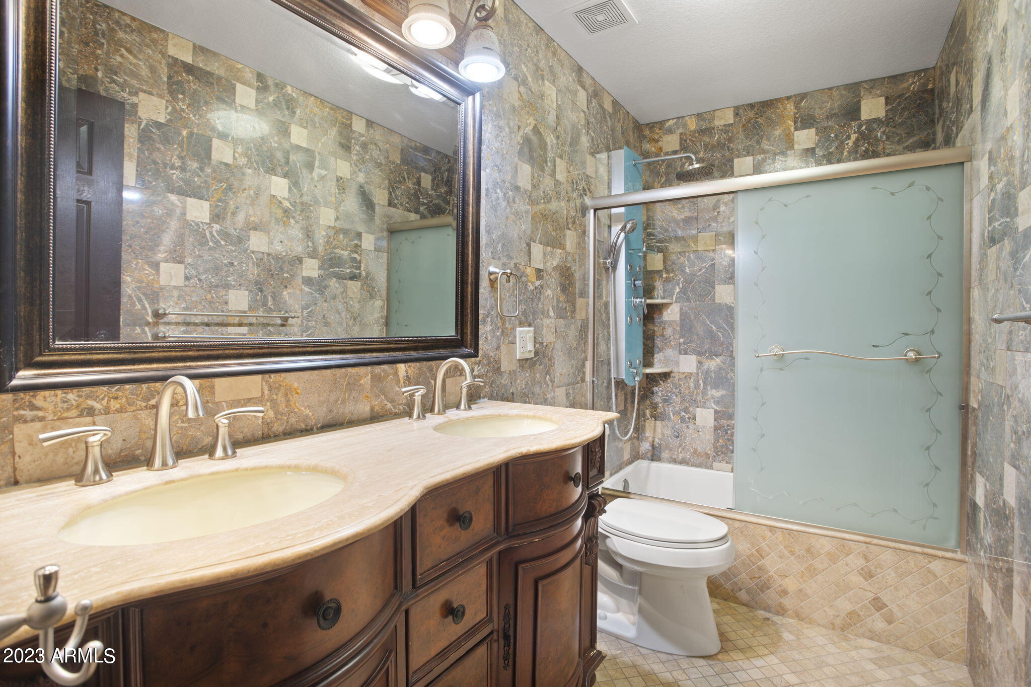 7775 North 52nd Drive Glendale, AZ 85301 - Photo 37 of 51 a bathroom with a sink toilet and shower