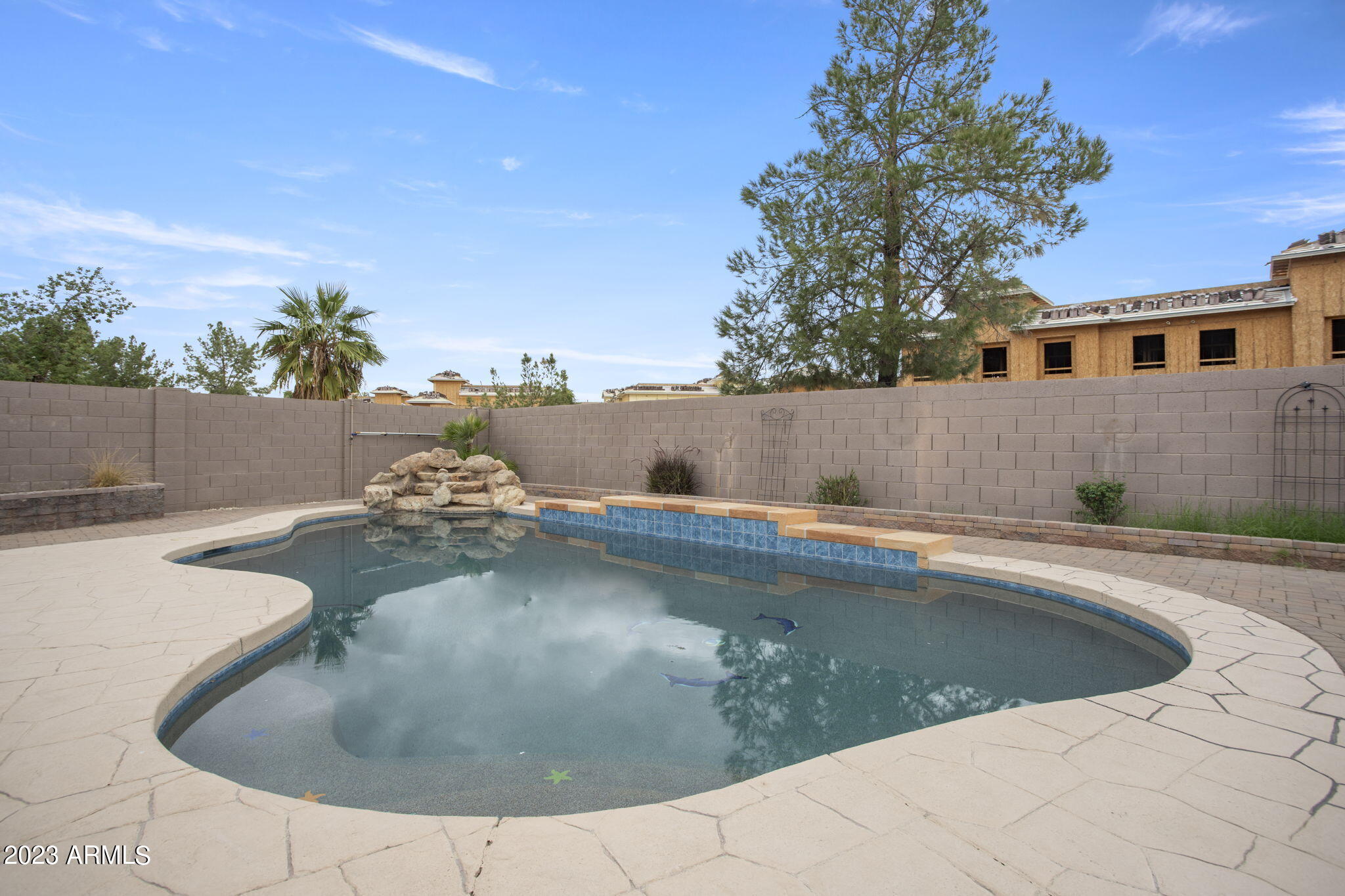 7775 North 52nd Drive Glendale, AZ 85301 - Photo 39 of 51 a view of a swimming pool with a yard
