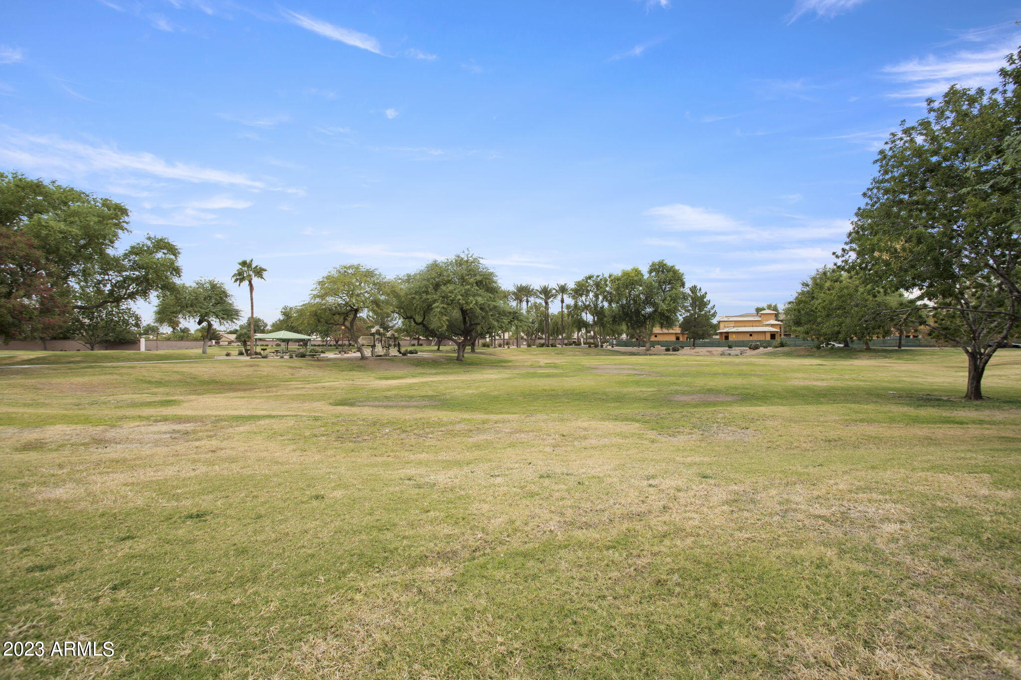 7775 North 52nd Drive Glendale, AZ 85301 - Photo 46 of 51 a view of a large body of water with a building in the background