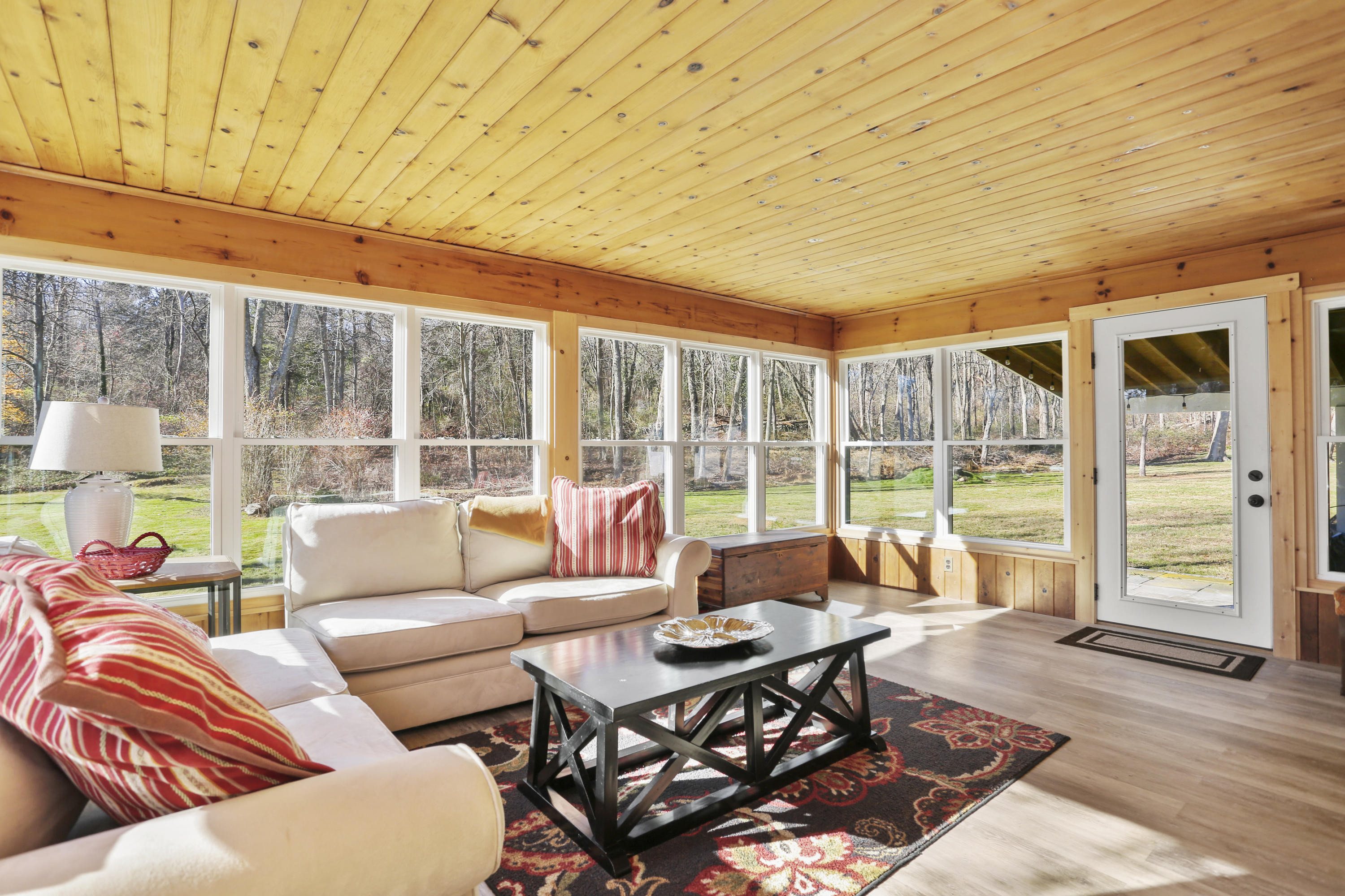 10 Stephen Mather Road Norwalk, CT 06850 - Photo 12 of 29 a living room with furniture and a floor to ceiling window
