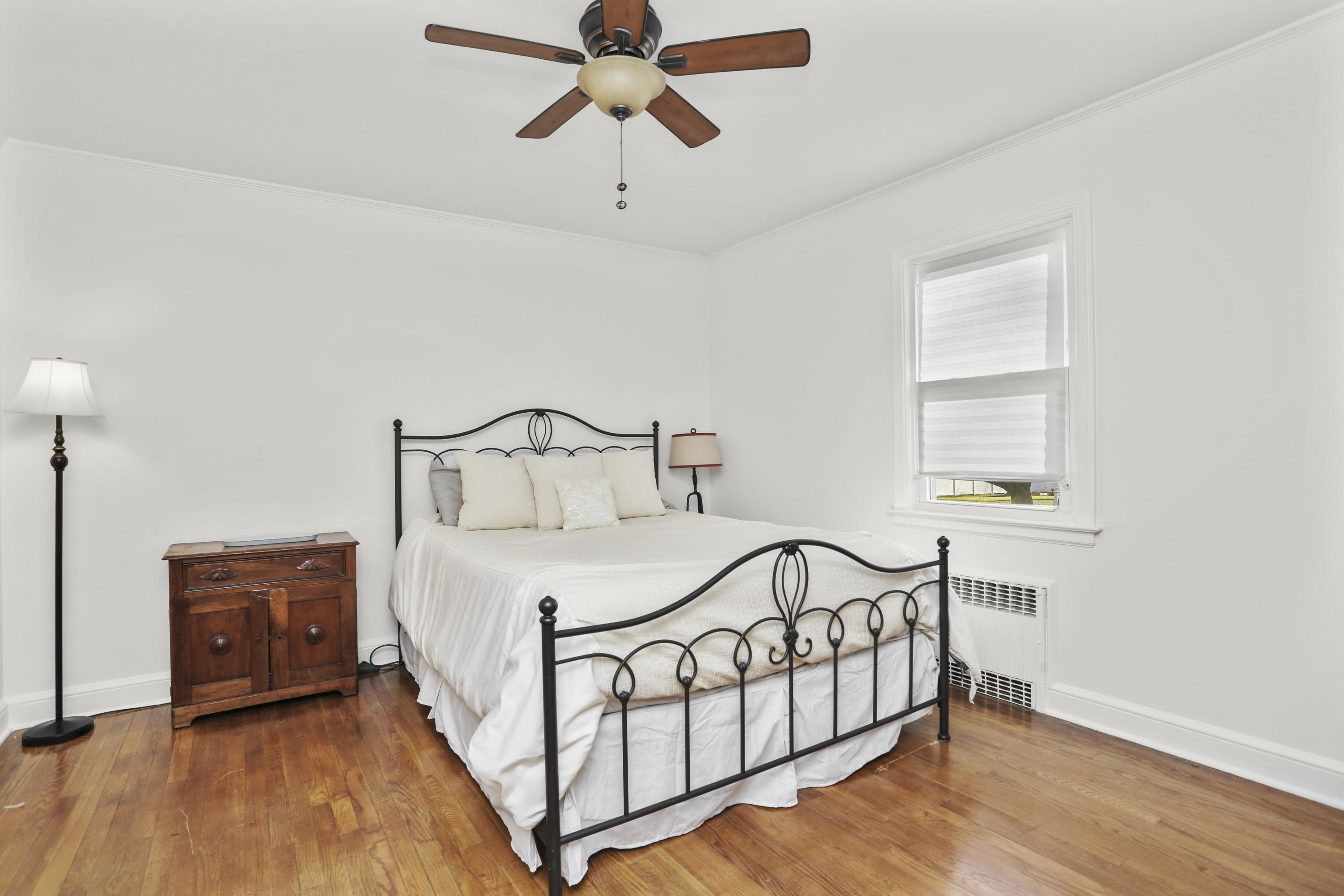 10 Stephen Mather Road Norwalk, CT 06850 - Photo 16 of 29 a bedroom with a bed and a window