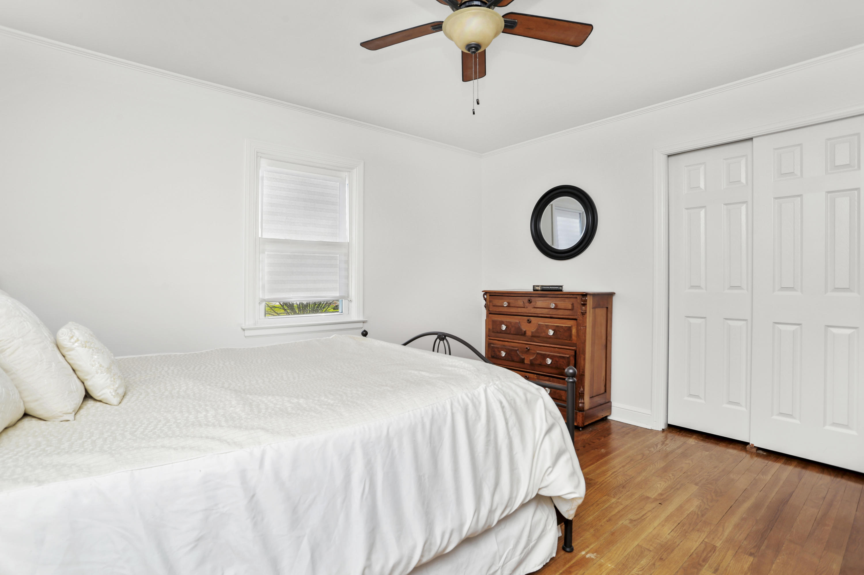 10 Stephen Mather Road Norwalk, CT 06850 - Photo 17 of 29 a bedroom with a bed and a window