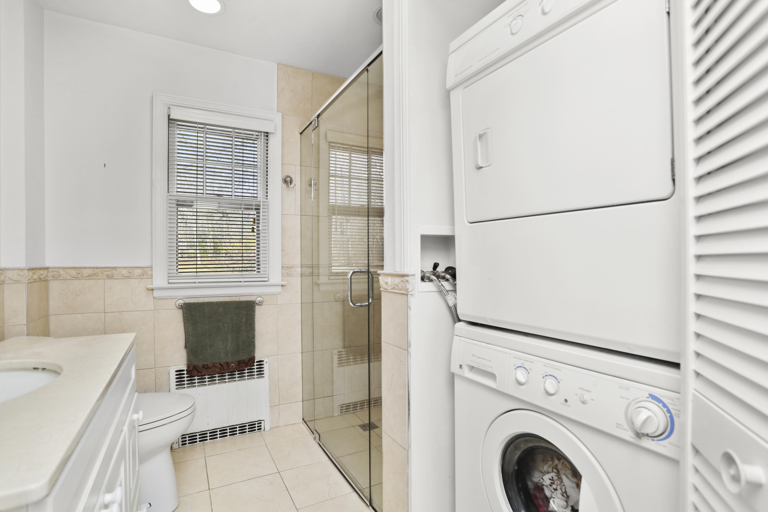 10 Stephen Mather Road Norwalk, CT 06850 - Photo 19 of 29 a utility room with dryer and washer