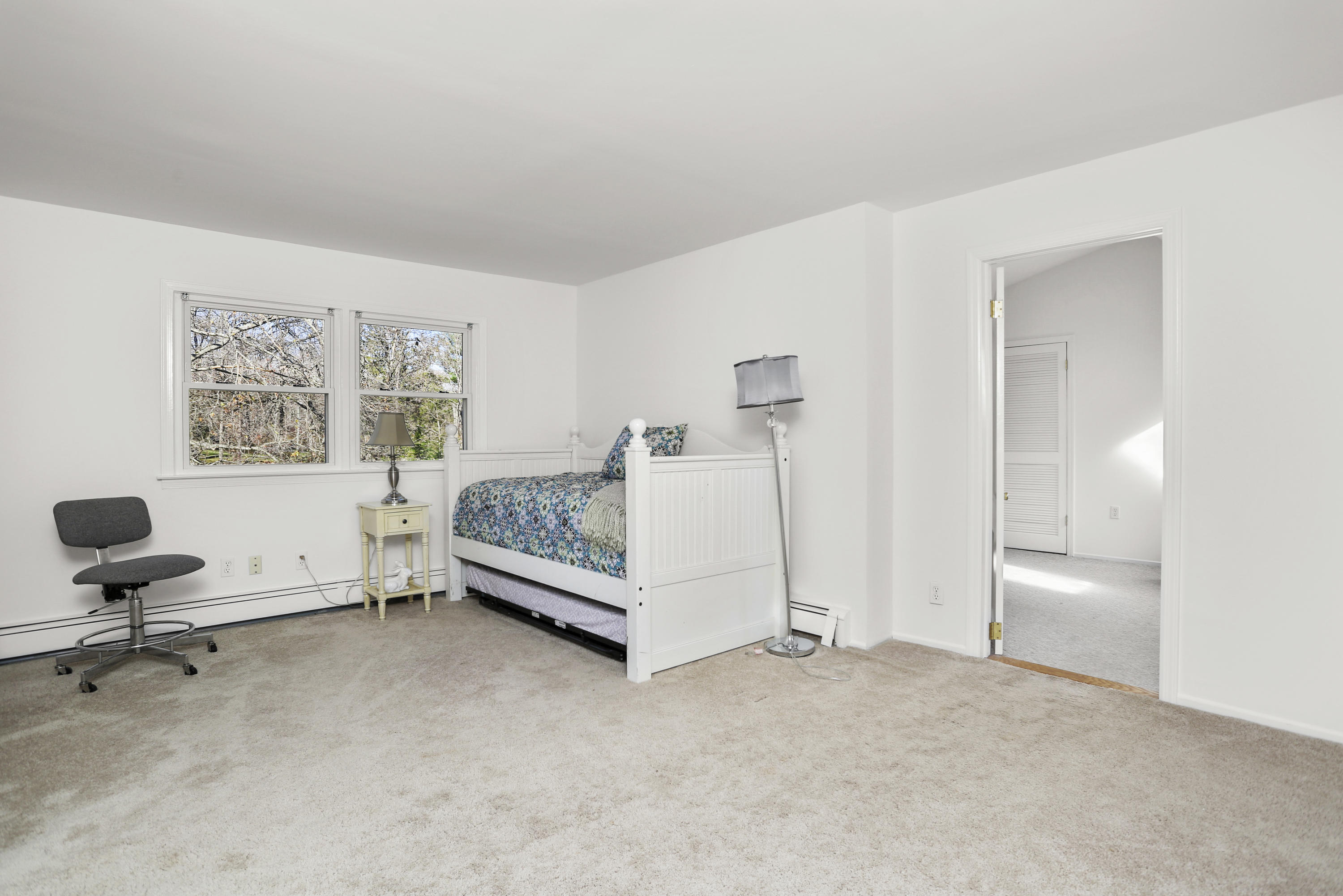 10 Stephen Mather Road Norwalk, CT 06850 - Photo 22 of 29 a bedroom with a bed and a desk