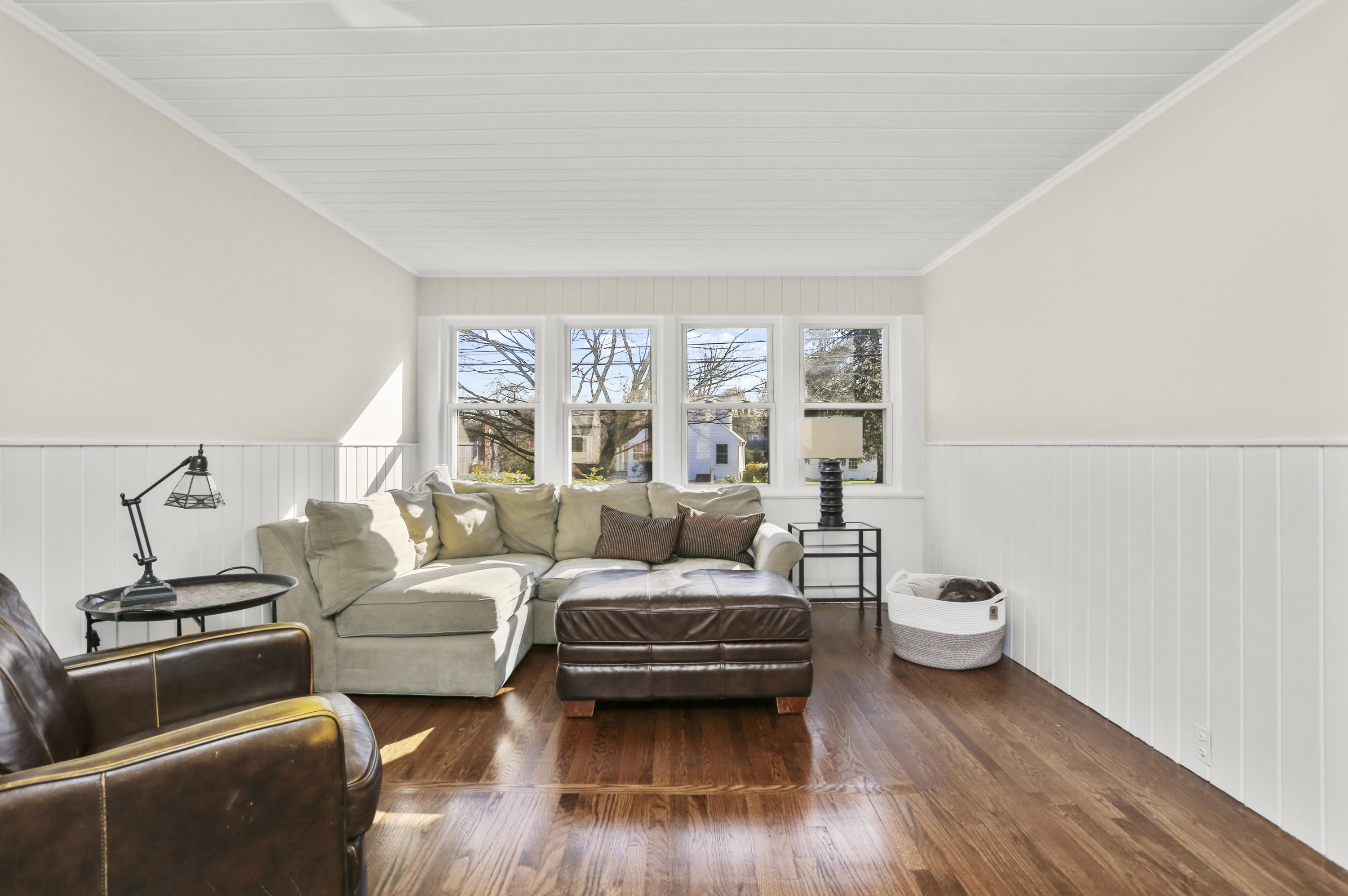 10 Stephen Mather Road Norwalk, CT 06850 - Photo 24 of 29 a living room with furniture and a toilet