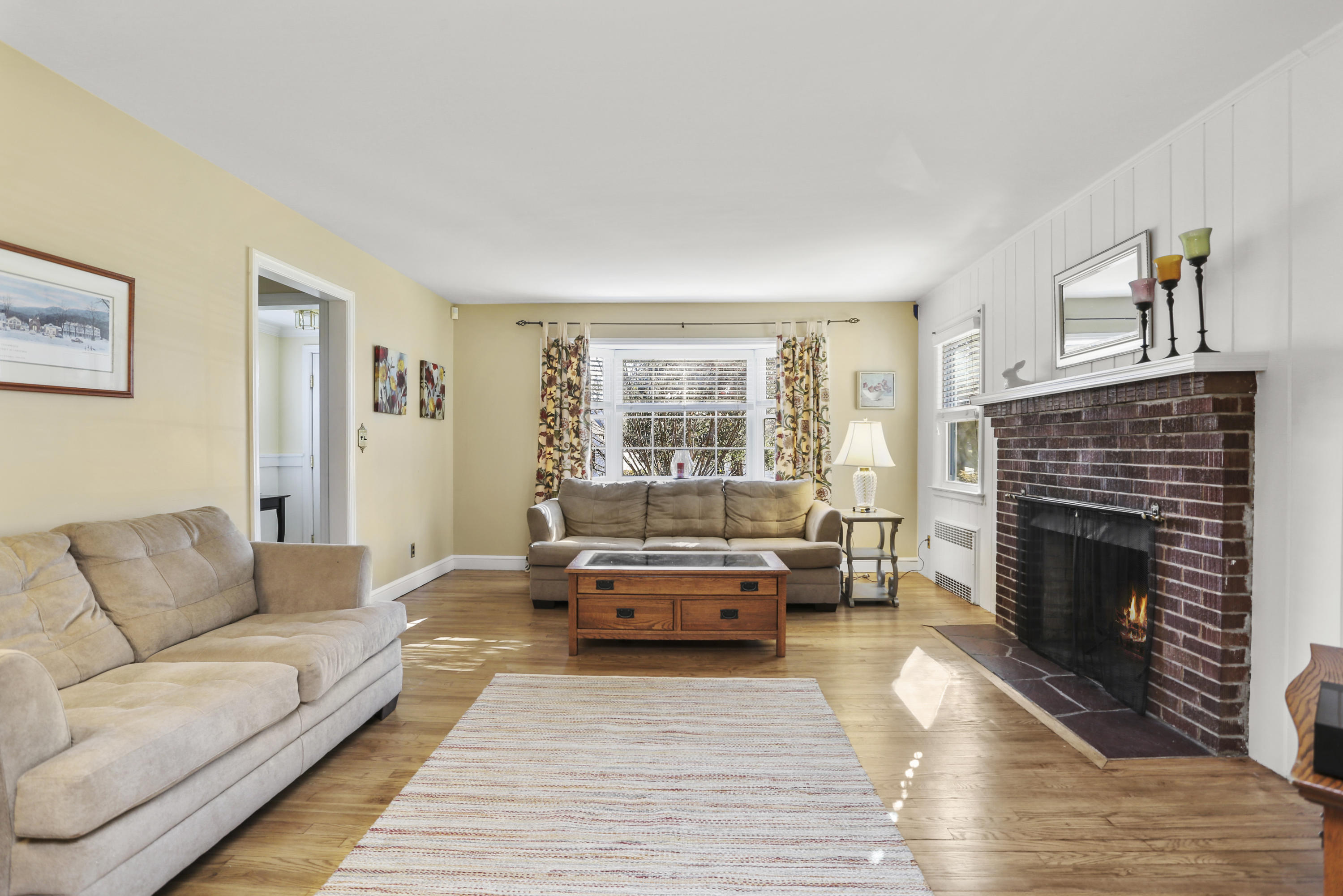 10 Stephen Mather Road Norwalk, CT 06850 - Photo 7 of 29 a living room with furniture and a fireplace